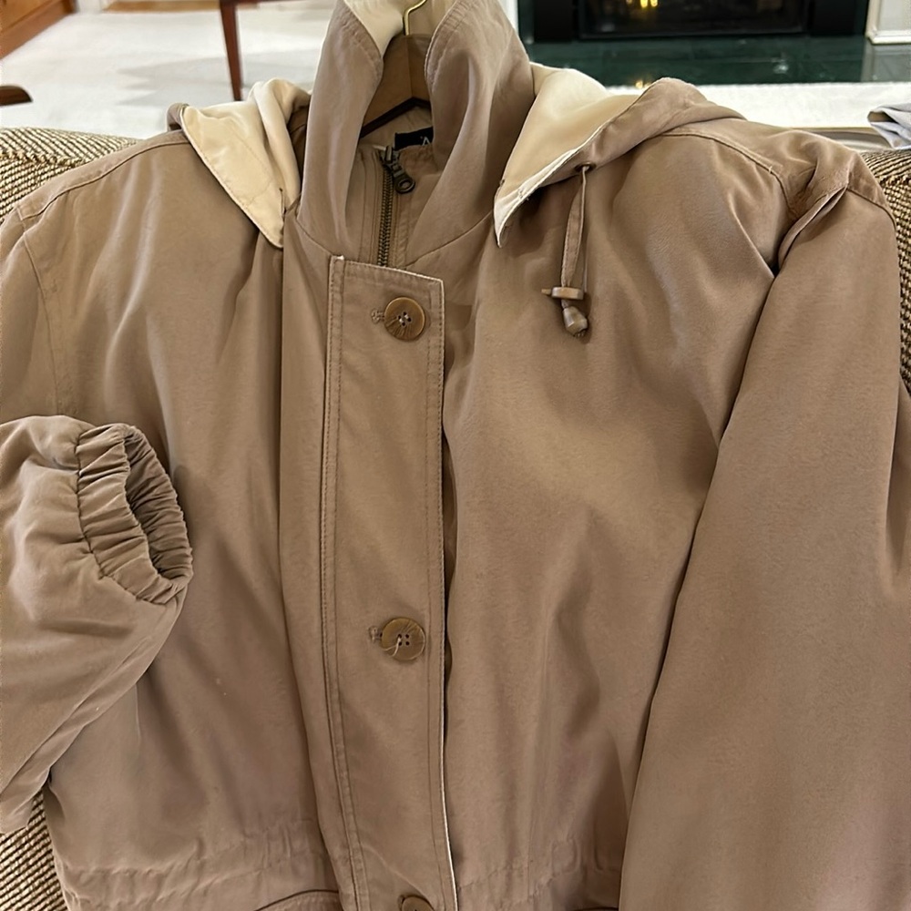 All weather jacket with detachable lining. Draw string cap&drW string for waist.